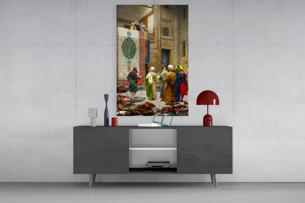 Carpet Seller glass wall art catching light to reveal its painted rugs