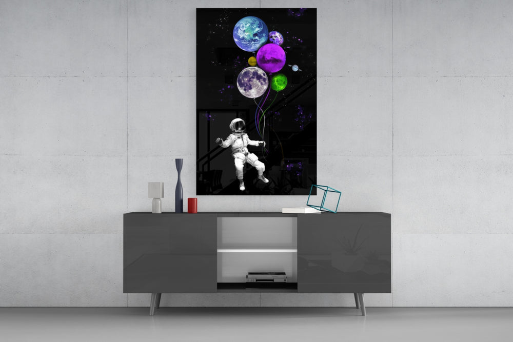 Baloonets glass wall art catching light to reveal its painted balloons