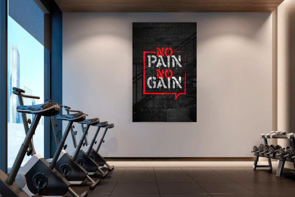 No Pain No Gain glass wall art catching light to reveal its painted bubble