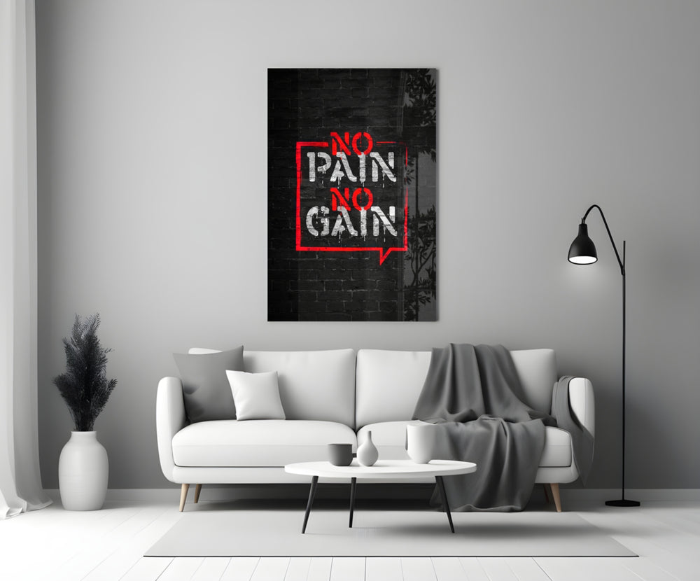 Close-up detail of scarlet No Pain No Gain bubble behind glass