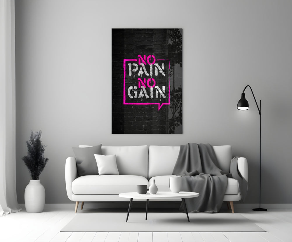 Close-up detail of magenta No Pain No Gain bubble behind glass