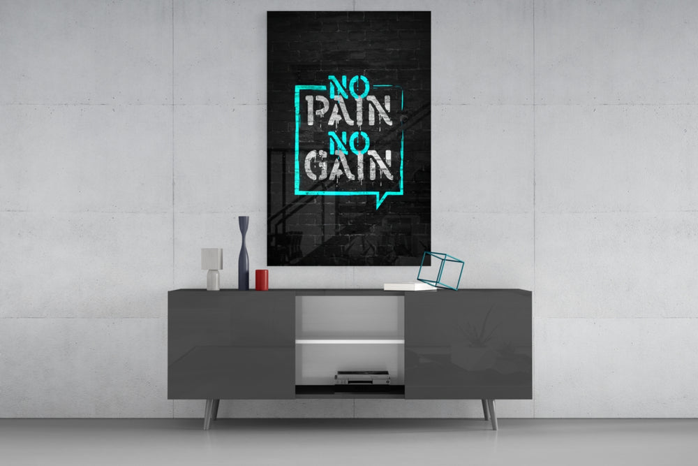 No Pain No Gain glass wall art catching light to reveal its painted bubble