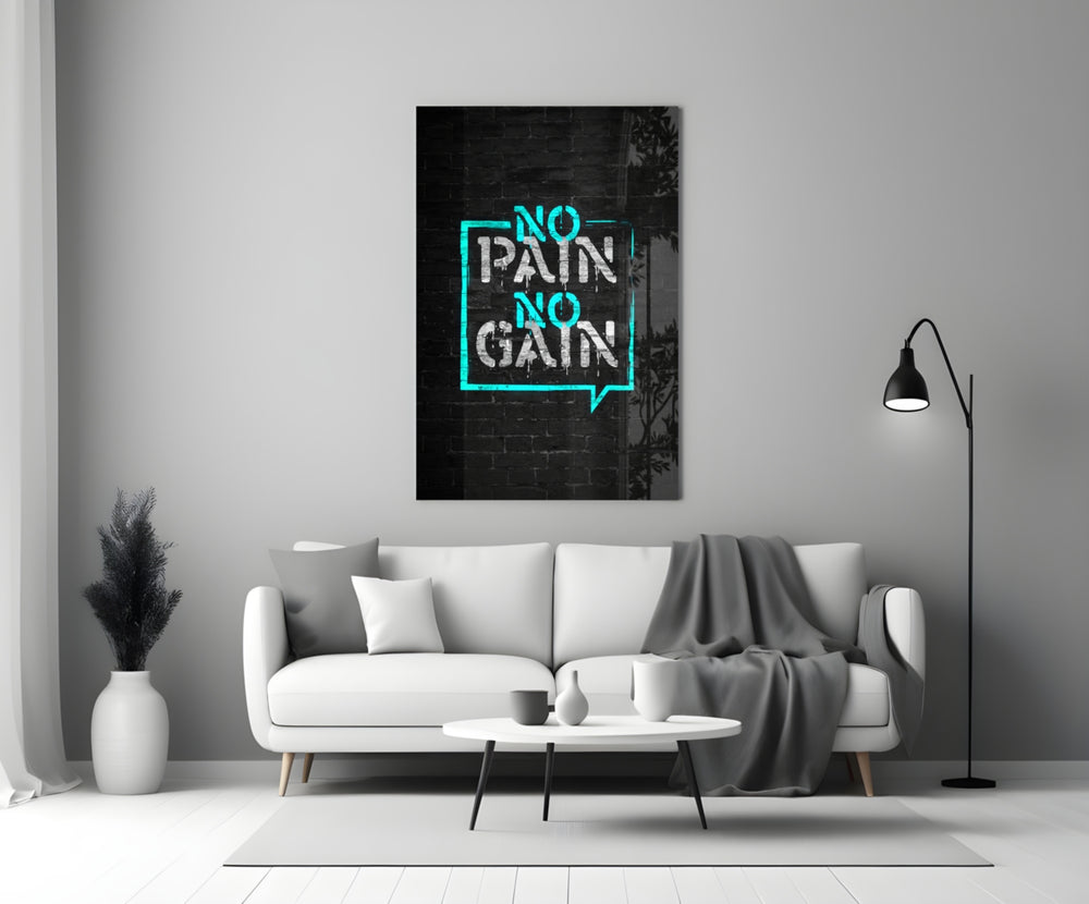 Close-up detail of cyan No Pain No Gain bubble behind glass