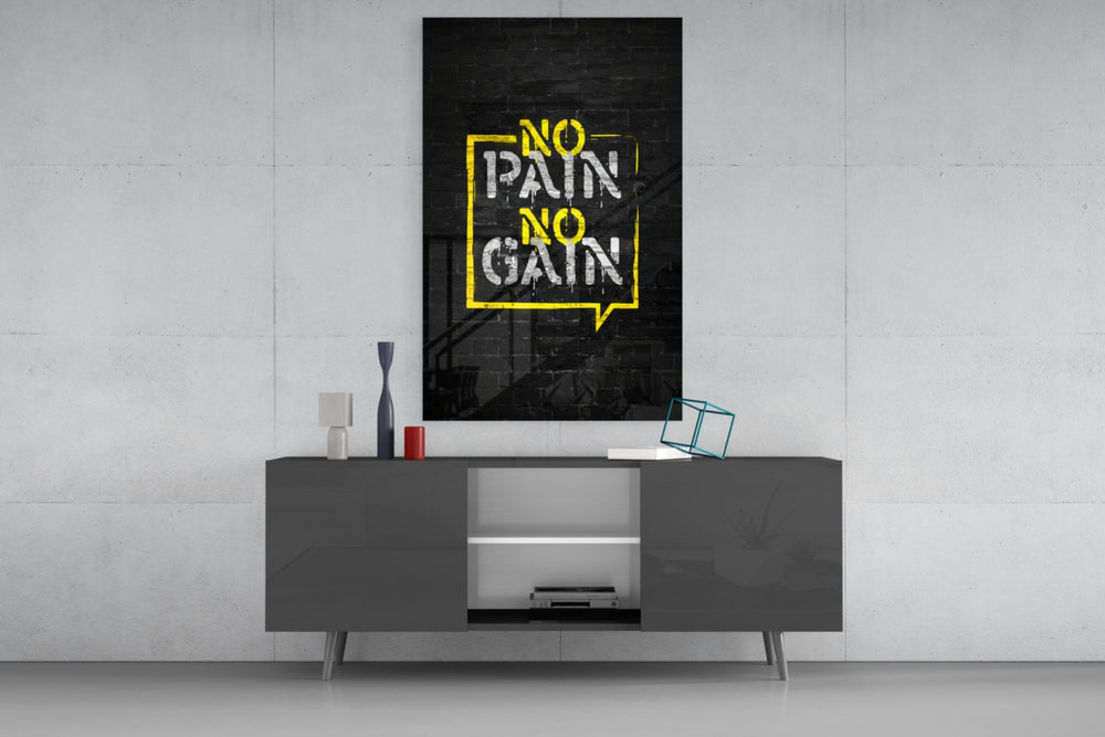 No Pain No Gain glass wall art catching light to reveal its painted bubble