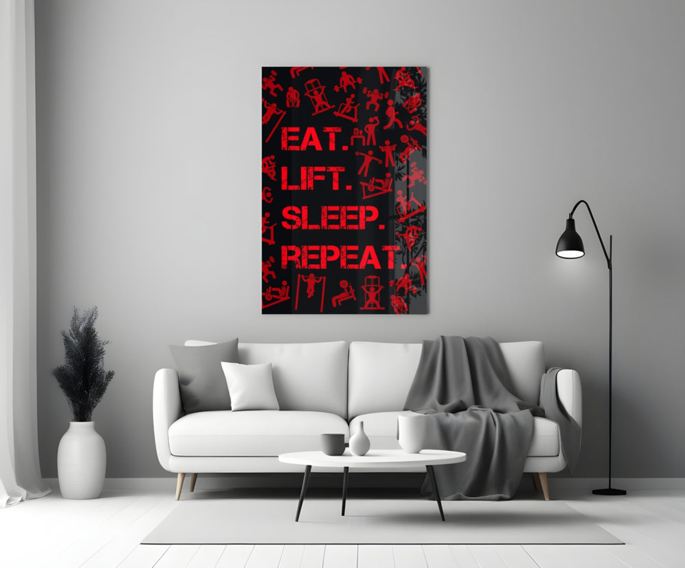 Close-up detail of scarlet Eat Lift Sleep Repeat typography behind glass