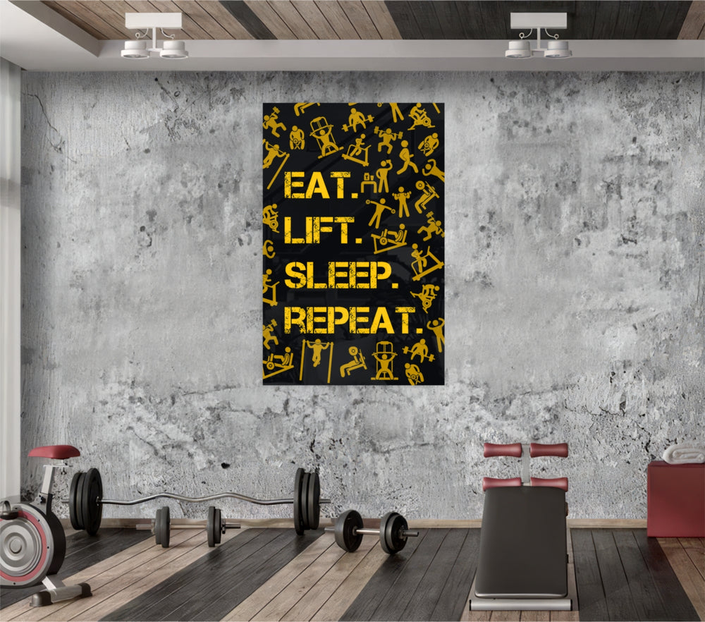 Eat, Lift, Sleep glass wall art catching light to reveal its painted pictograms