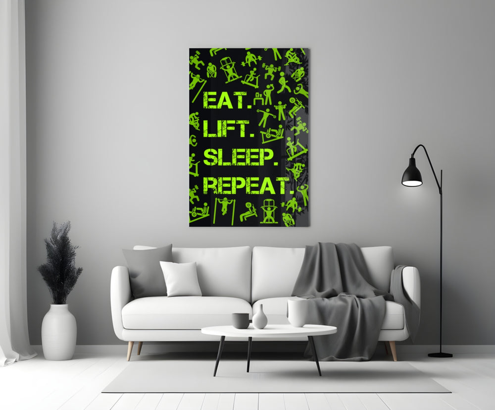 Close-up detail of chartreuse Eat Lift Sleep Repeat typography behind glass