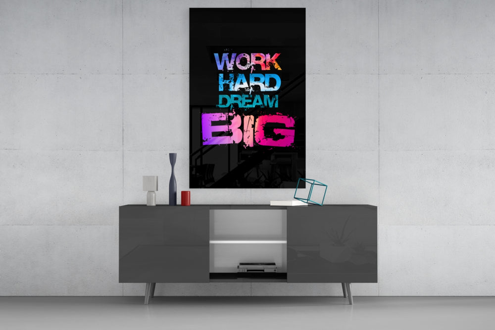 Dream Big glass wall art catching light to reveal its painted gradient