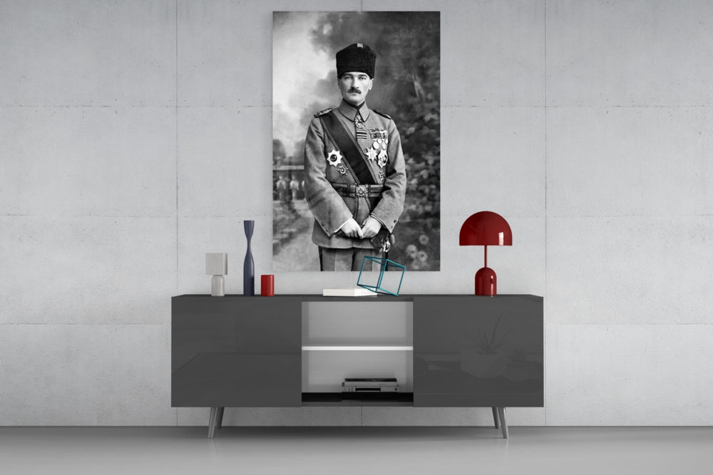 Atatürk glass wall art catching light to reveal its painted medals