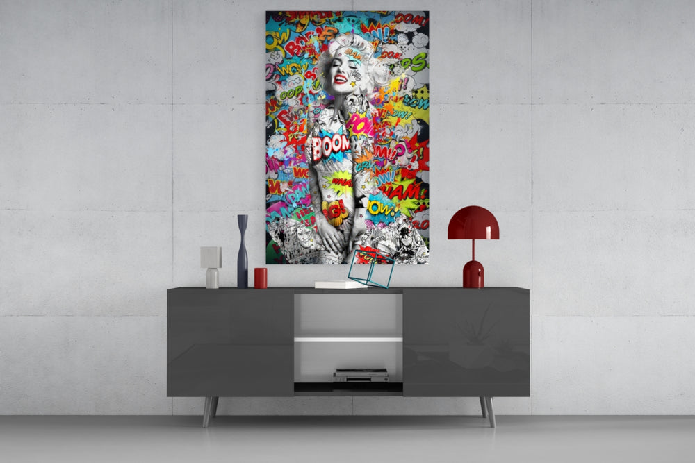 Graffiti glass wall art catching light to reveal its painted comic-bubbles