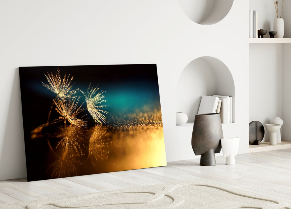 Close-up detail of golden dandelion bokeh behind glass