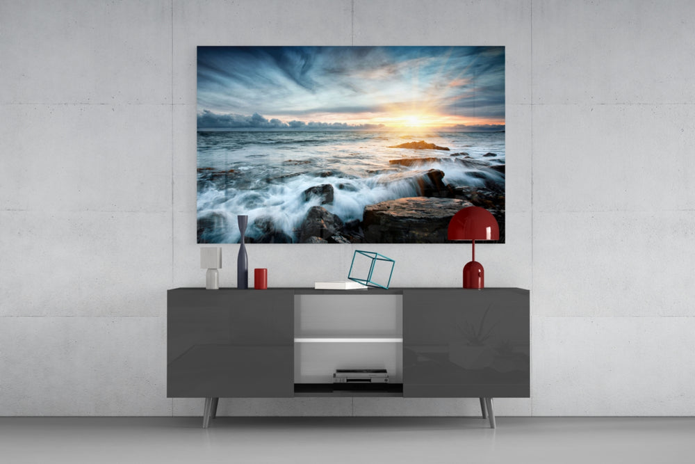 Sunset glass wall art catching light to reveal its painted surf