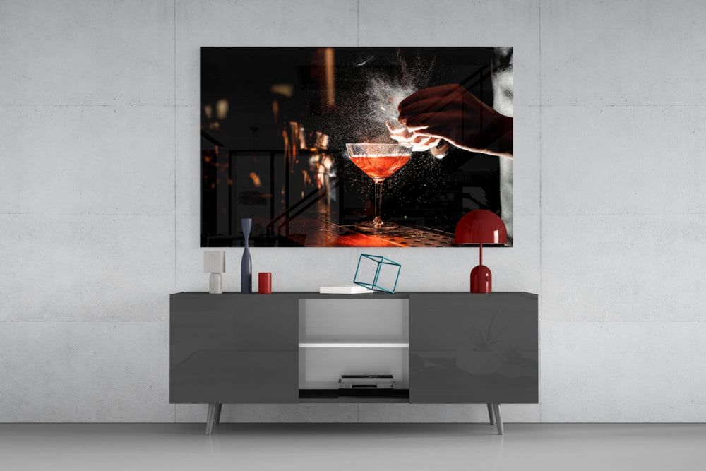 Cocktail glass wall art catching light to reveal its painted spritz