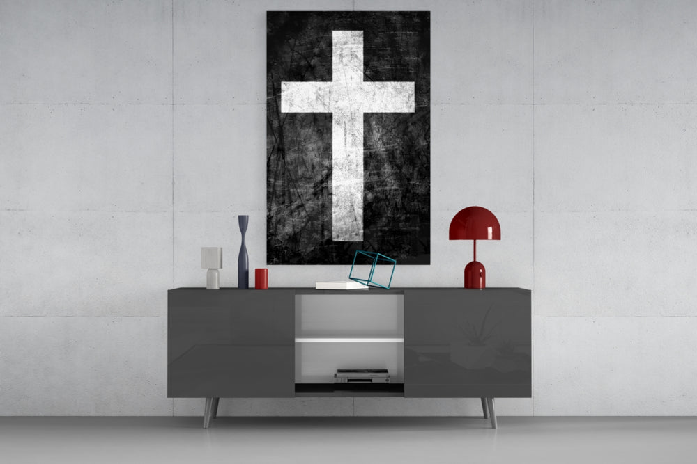 Cross glass wall art catching light to reveal its painted grunge