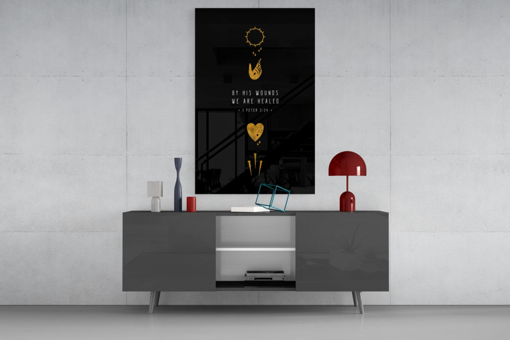 We are Healed glass wall art catching light to reveal its painted gold
