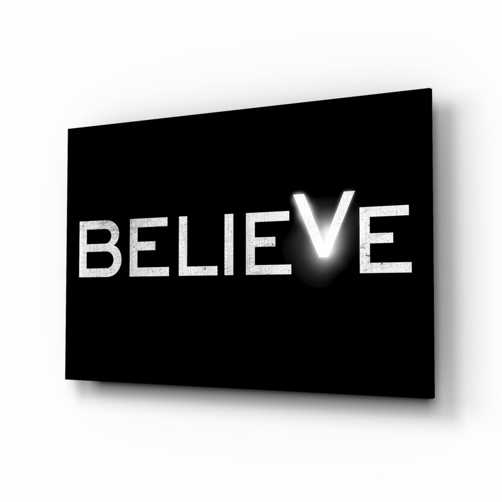 Believe glass wall art in a modern study