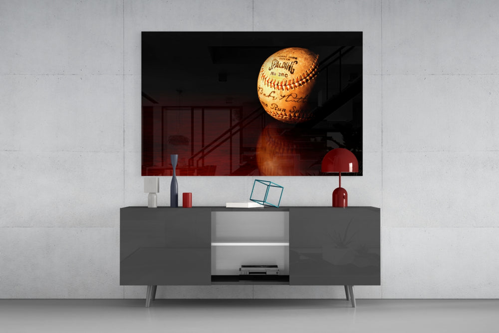Baseball glass wall art catching light to reveal its painted seams