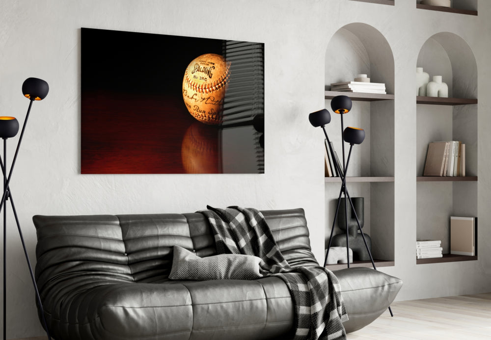 Baseball artwork styled in a sports den interior