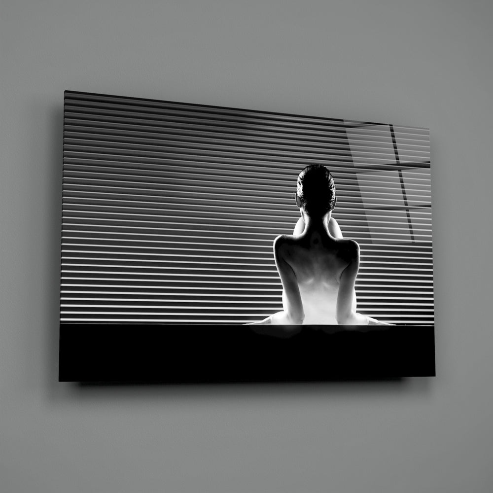 Editorial portrait panel anchoring a master bedroom wall