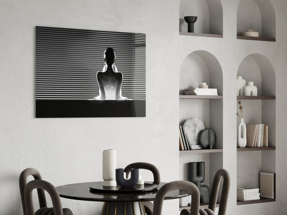 Editorial glass print bringing modern-luxe edge to a feminine living room