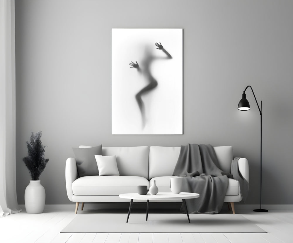 Close-up detail of frosted-glass woman silhouette behind glass