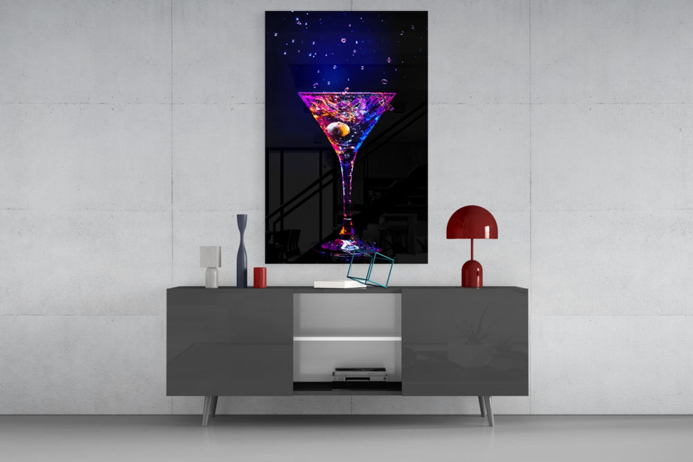 Cocktail glass wall art catching light to reveal its painted splash