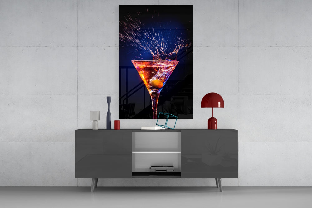 Cocktail glass wall art catching light to reveal its painted splash