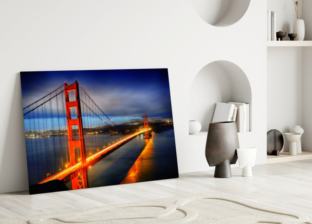 Close-up detail of Golden Gate night-glow behind glass