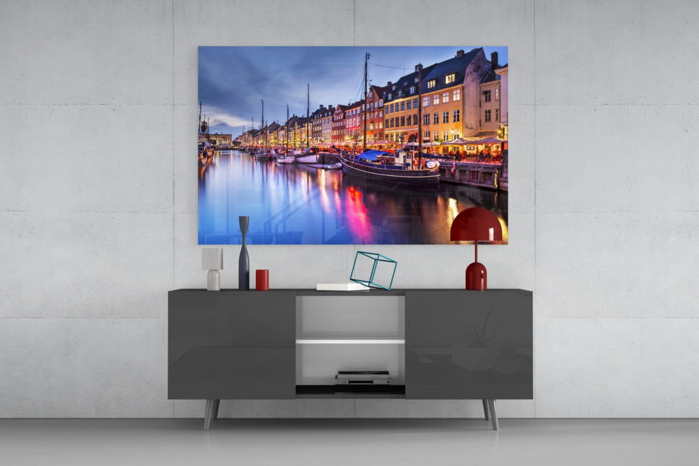 Nyhavn glass wall art catching light to reveal its painted lamps
