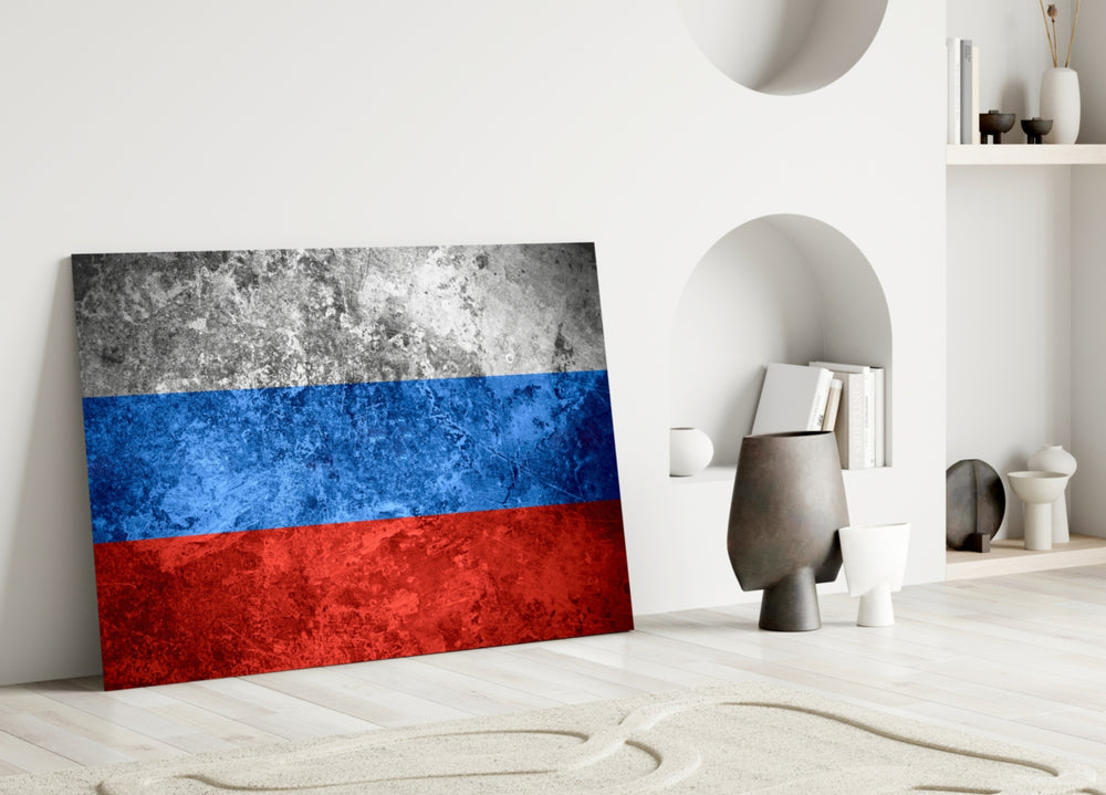 Close-up detail of grunge Russian tricolor behind glass