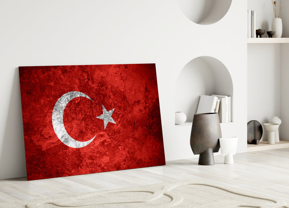 Close-up detail of grunge Turkish flag behind glass