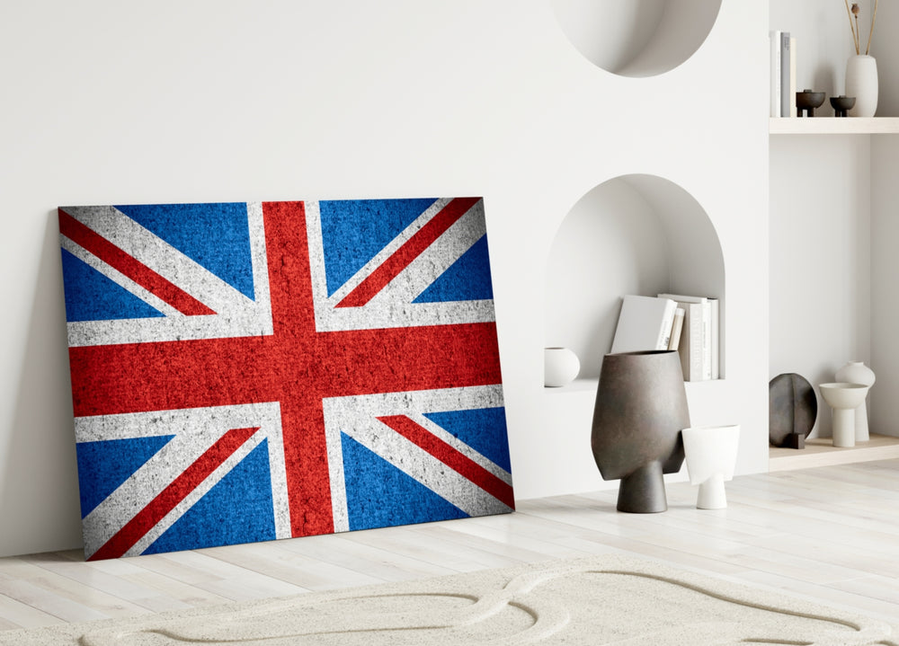 Close-up detail of grunge Union Jack behind glass