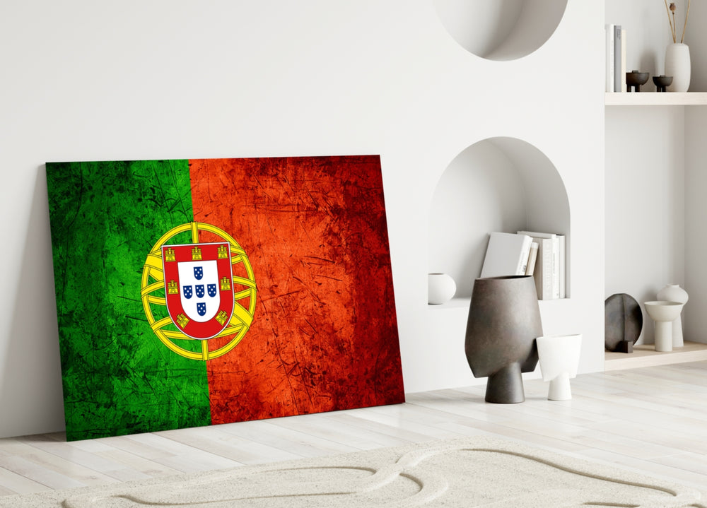 Close-up detail of grunge Portuguese flag behind glass