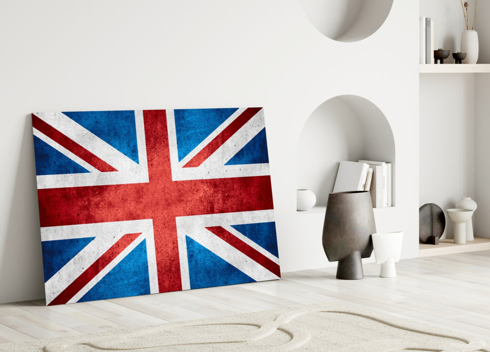 Close-up detail of plaster Union Jack behind glass