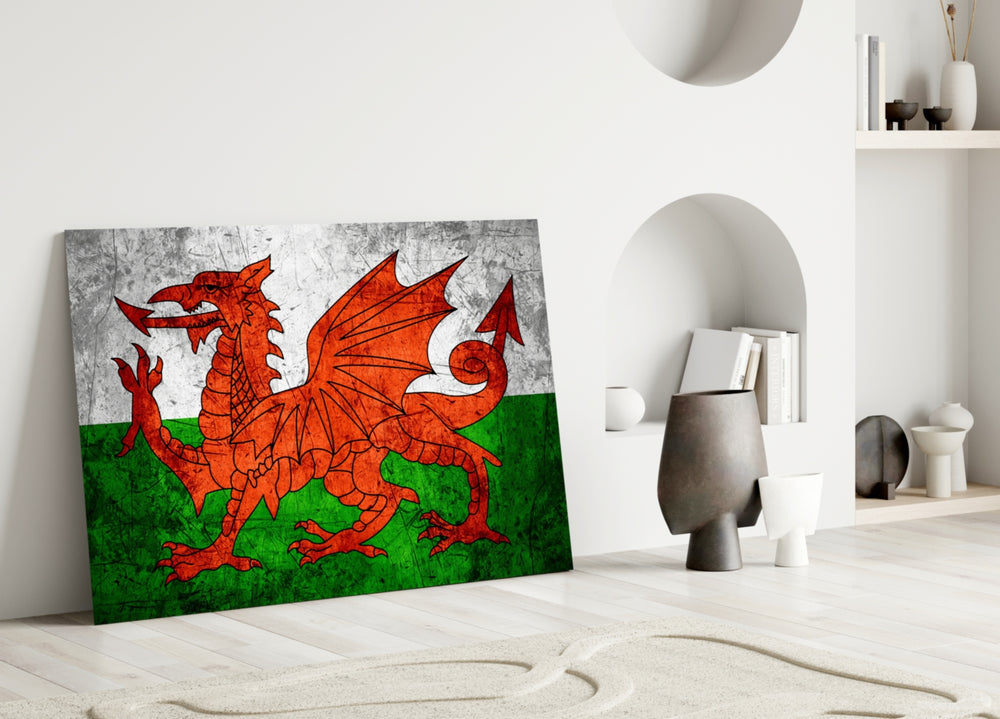Close-up detail of grunge Welsh dragon behind glass