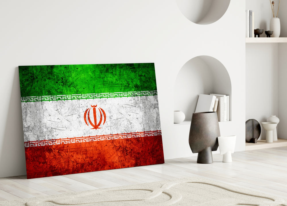 Close-up detail of grunge Iranian tricolor and emblem behind glass