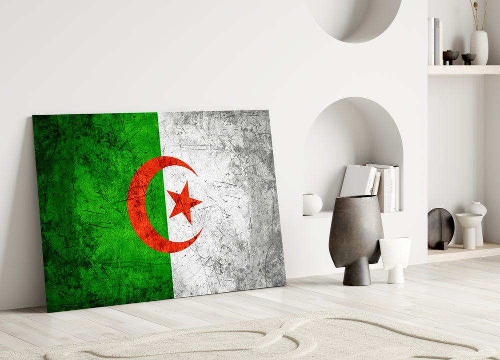 Close-up detail of grunge Algerian crescent-and-star behind glass