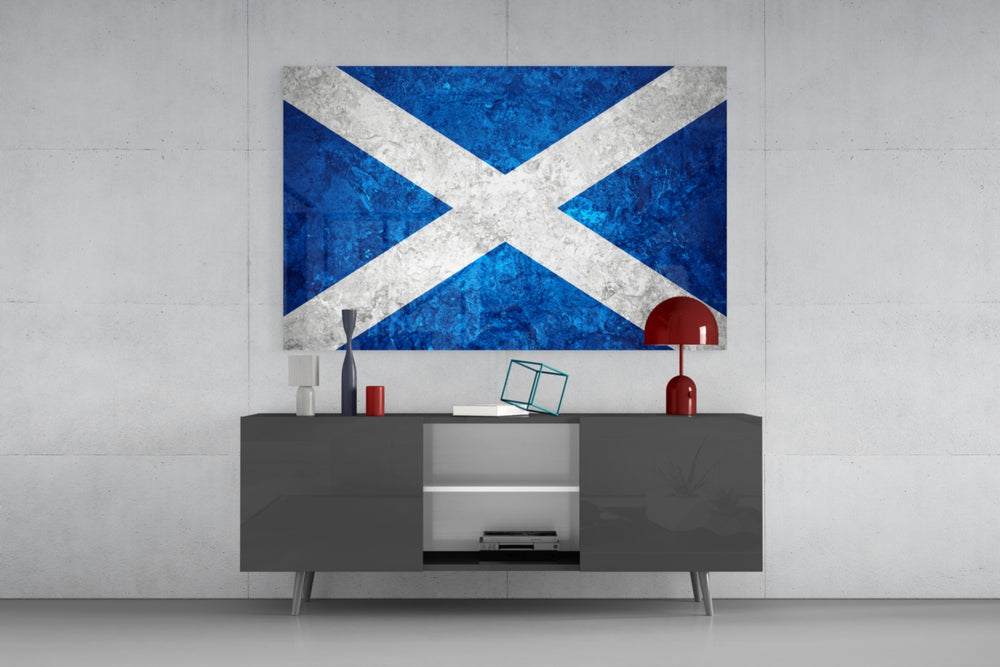 Flag of Scotland glass wall art catching light to reveal its painted stone-grunge