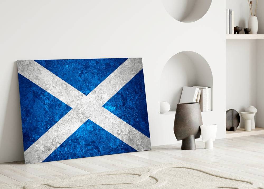Close-up detail of rough-stone cobalt saltire behind glass