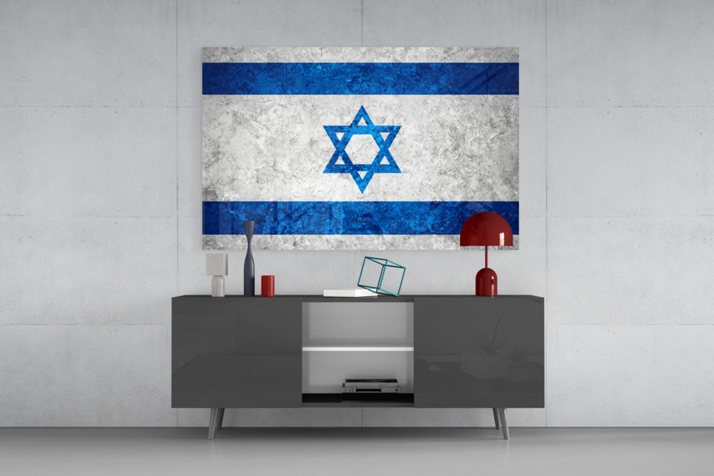 Flag of Israel glass wall art catching light to reveal its painted stone-grunge