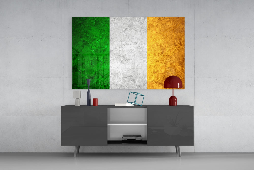 Flag of Ireland glass wall art catching light to reveal its painted stone-grunge