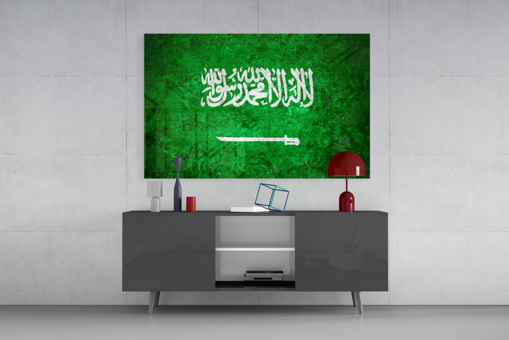 Flag of Saudi Arabia glass wall art catching light to reveal its painted stone-grunge