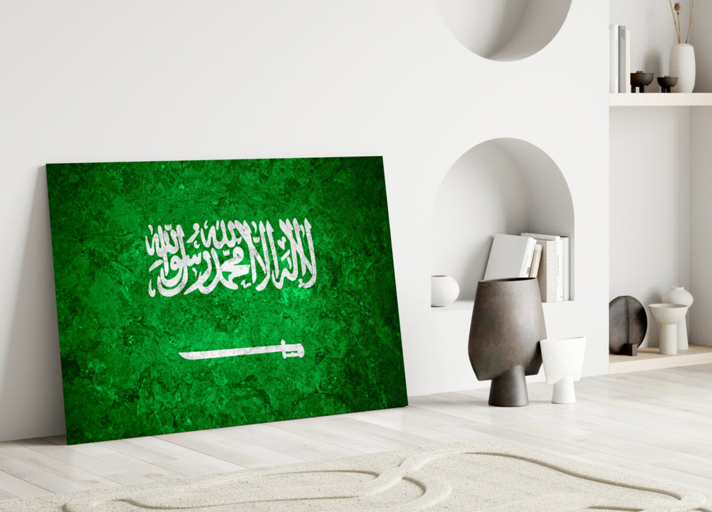 Close-up detail of rough-stone Saudi Shahada calligraphy behind glass
