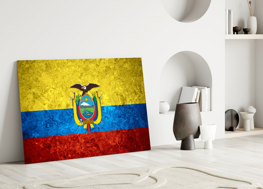 Close-up detail of rough-stone Ecuadorian condor emblem behind glass