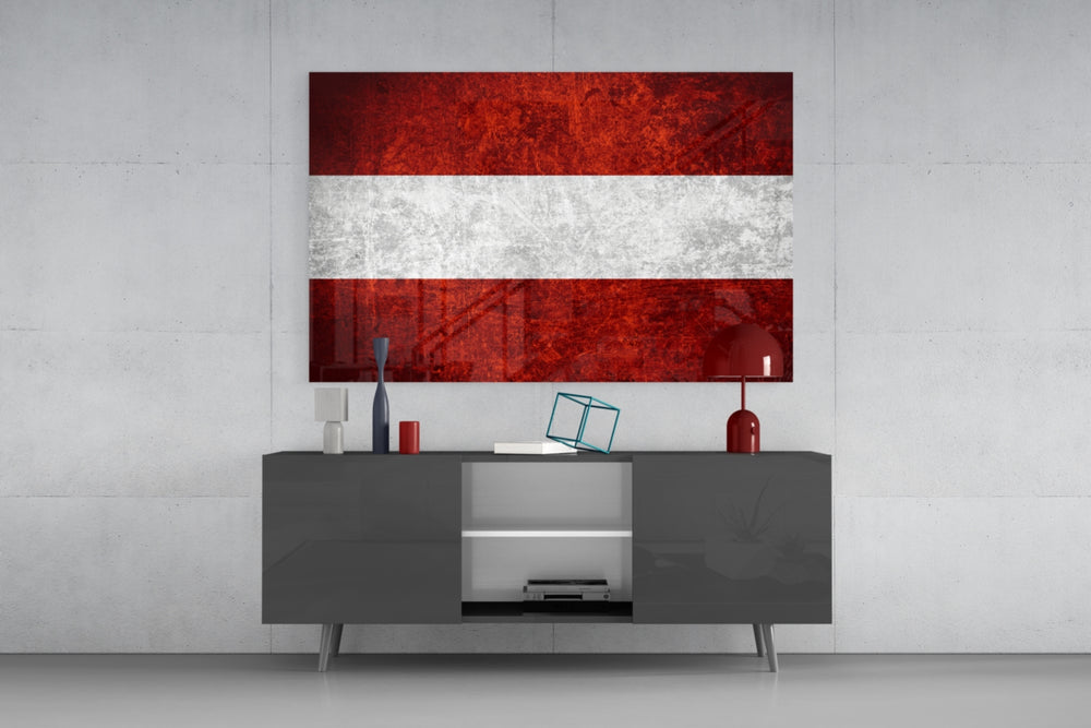 Flag of Austria glass wall art catching light to reveal its painted scratched-metal grunge
