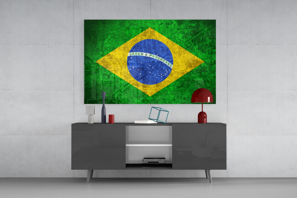Flag of Brasil glass wall art catching light to reveal its painted scratched-metal grunge