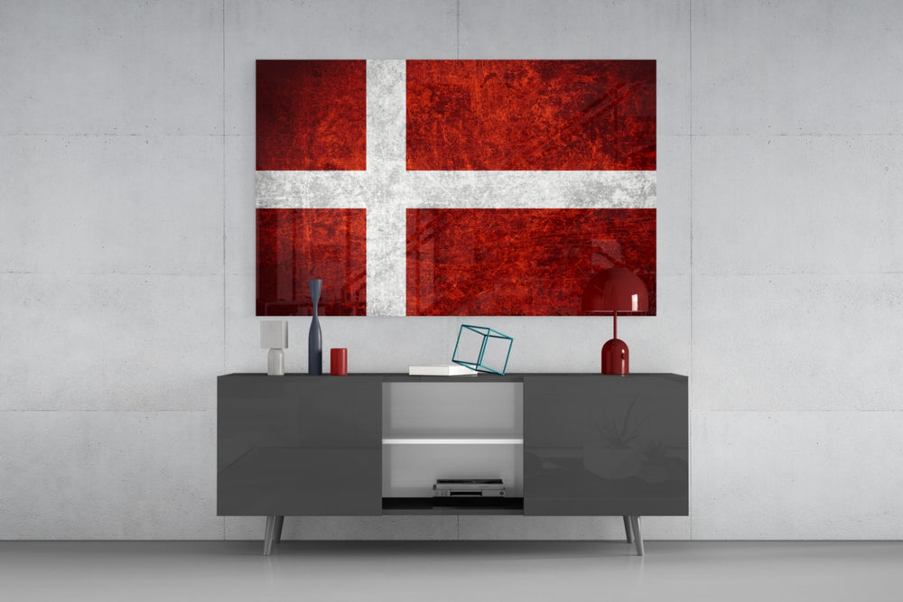 Flag of Denmark glass wall art catching light to reveal its painted scratched-metal grunge