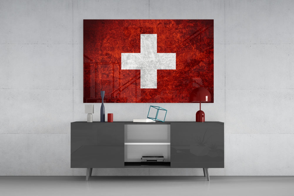 Flag of Switzerland glass wall art catching light to reveal its painted scratched-metal grunge