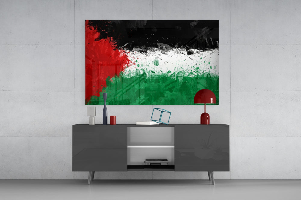 Flag of Palestine glass wall art catching light to reveal its painted splatter texture