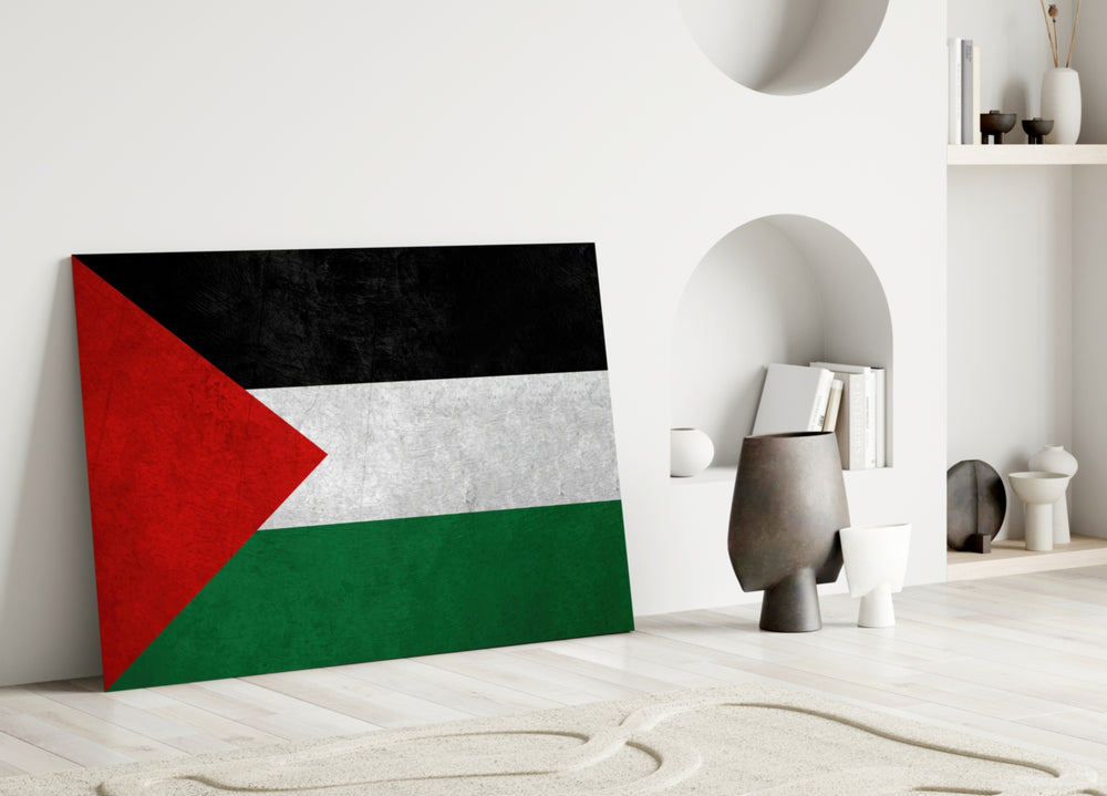 Close-up detail of clean-graphic Palestinian flag behind glass